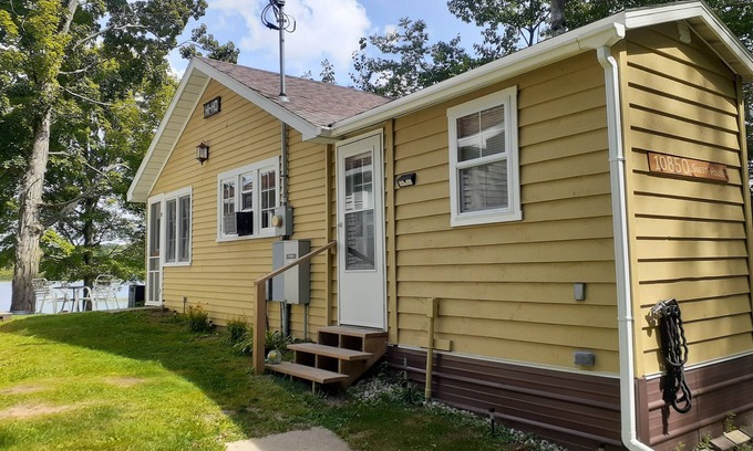 Broomfield Cabin | Cozy lakefront cabin with fireplace, private beach, kayaks. Open year round!