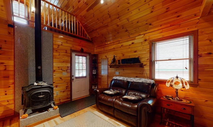 Greenville House | Cozy lakefront home on Sandy Bay w/common beach, boat mooring & gas grill