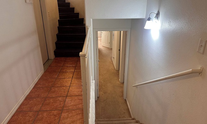 Los Lunas House | Cozy large home with. Downstairs with a closed door will be the rented space