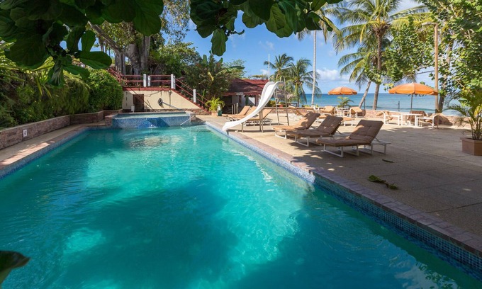 Crown Point Resort | Cozy loft in Tropical Paradise within walking distance to the beach!