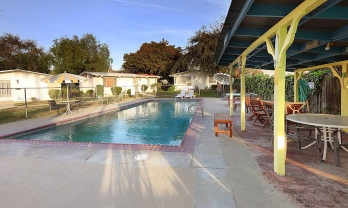 Whittier Cottage | Cozy Pool Side Cottage in Park like Setting.