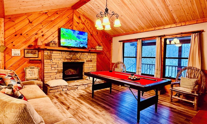Gatlinburg - Pigeon Forge Cabin | Cozy Riverfront Cabin with Creek Views, Hot Tub, Pool Table, and Fire Pit