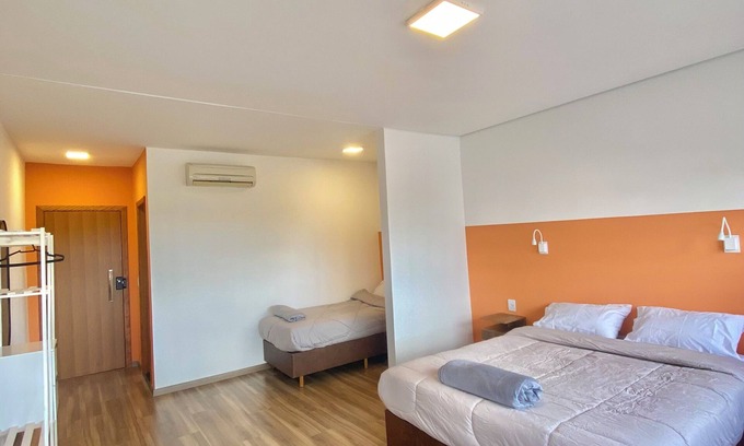 Champagnat House | Cozy room in shared house. Easy access location.