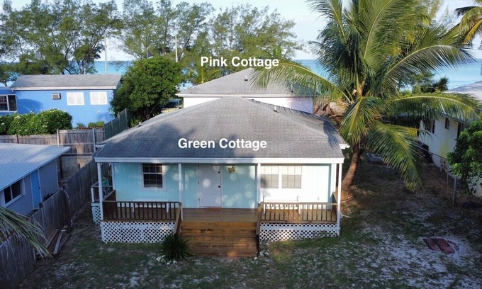 Alice Town House | COZY SEASIDE 2 BED/2 BATH BIMINI COTTAGE-BAY SIDE VIEW -soft green colored house