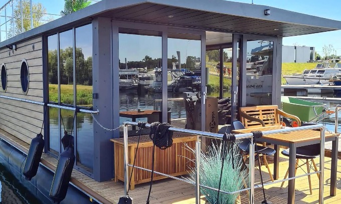 Ophoven Boat Rental | Cozy ship in Ophoven with lake view