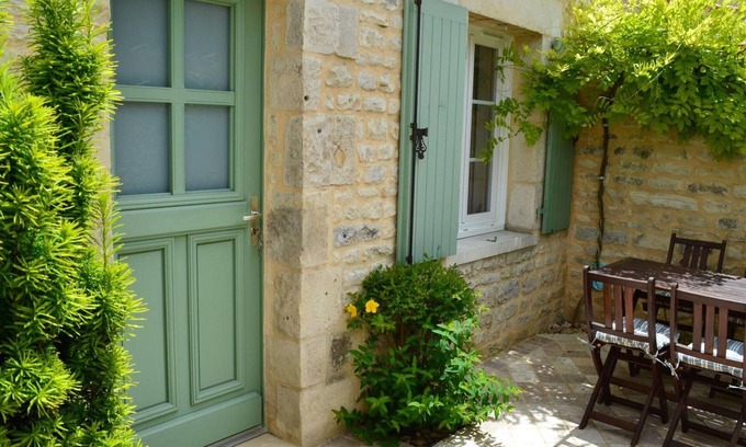 Coulonges Cottage | Cozy Stone House with Private Garden, Bikes, and Baby Equipment
