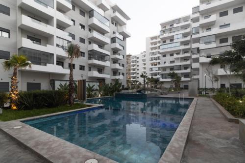Ain Harrouda Apartment | Cozy studio with great pool views