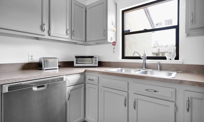 Southside House | Cozy townhouse, centrally located with garage and fenced yard.