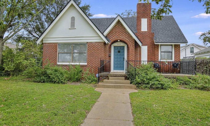 Austin Ave. House | Cozy Tudor Bungalow in Waco