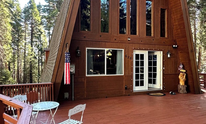 Lake Almanor Country Club Cabin | Cozy cabin retreat among the trees. Charming 3 bedroom/2 bath with hot tub.