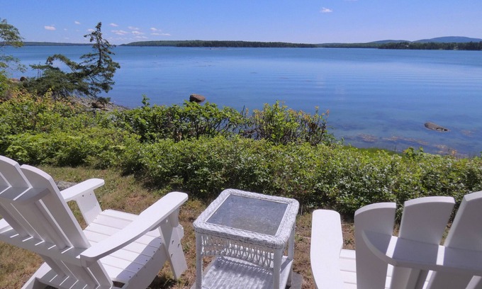 Trenton Cottage | Cozy waterfront getaway for two with views of the ocean and mountains in Acadia!