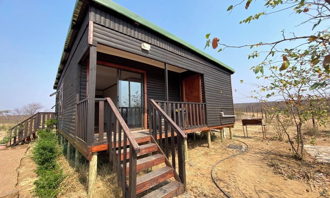 Palapye Cabin | Cozy wooden cabin overlooking the foot of the Tswapong Hills in Palapye.
