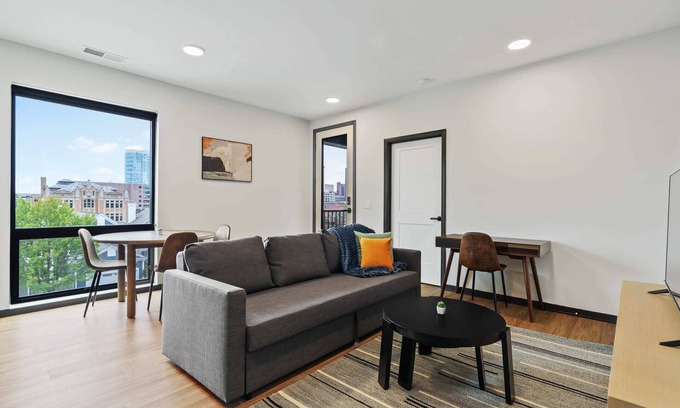 Lockerbie Square Apartment | CozySuites Mass with parking, lounge and roof deck 7