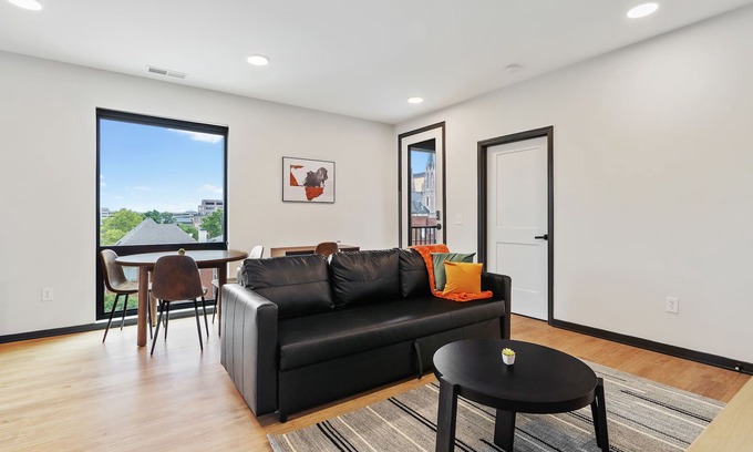 Lockerbie Square Apartment | CozySuites Mass with parking, lounge and roof deck 6
