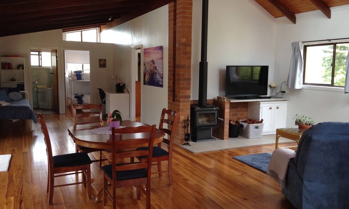 Cranley Cottage | Cranley Garden Retreat with Fireplace & Pool