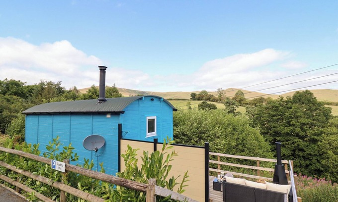 Oswestry Cottage | CUCKOO AT WILD VALLEY HUTS, pet friendly in Llanrhaeadr-Ym-Mochnant