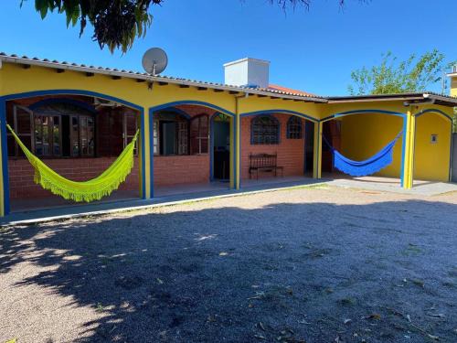 Palhoca House | Curta o paraíso Enseada de Brito