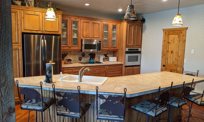 Island Park Cabin | Custom lake cabin, private boat dock, firepit, 45 min. from Yellowstone Park.