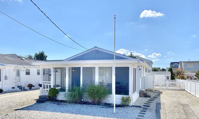 Avalon Cottage | Cute seashore cottage within walking distance to beach & shopping, screened porch