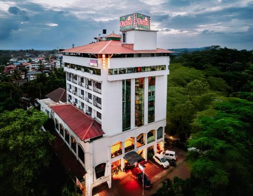 Onamthuruth Hotel | Daan Orchid Residency