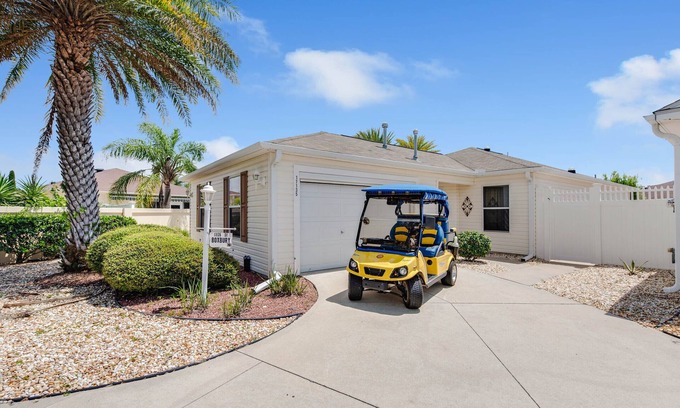 Villas of Greenwood Villa | DARLING 2 BEDROOM VILLA WITH ENCLOSED LANAI LARGE BACKYARD AND GOLF CART