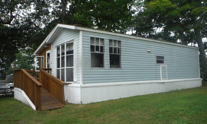 Curtis House | Darling Park Model Trailer downtown Curtis with views of South Manistique Lake