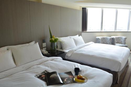 West District Hotel | de rěve Express Hotel