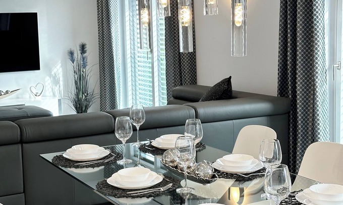 Langweid Apartment | Exclusive Designer - Holiday apartment Black White 124 m²