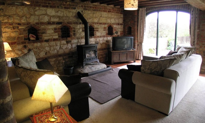 Buckton Cottage | Deceptively spacious and cosy cottage with enclosed gardens and hot tub.