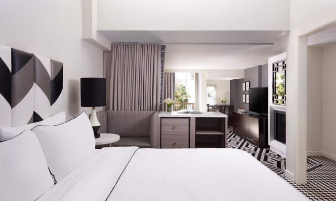 Norma Triangle Hotel | Decompress and Destress at an Elegant Suite with a Rooftop Pool, Four Units!