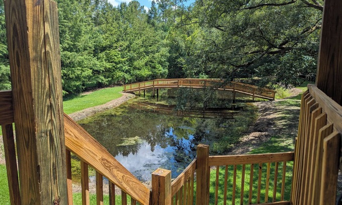 Picayune House | Delightful 4-BR with pond, deck, spacious yards in Picayune