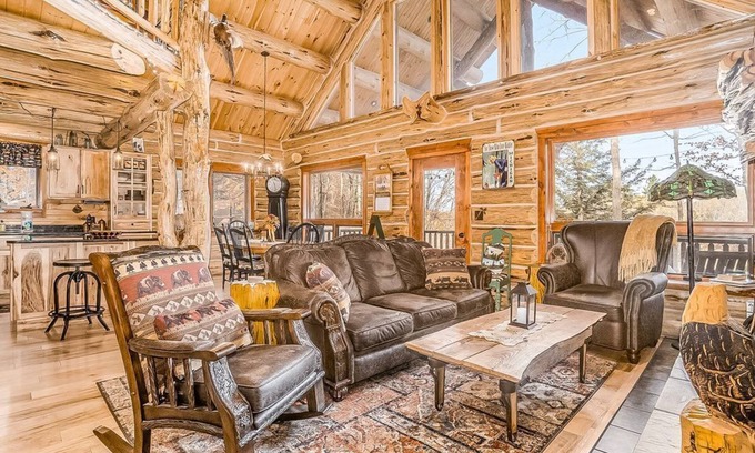 Thompsonville Cabin | Delightful Riverfront Cabin with Wood-Burning Fireplace and Gas Grill & Hot Tub
