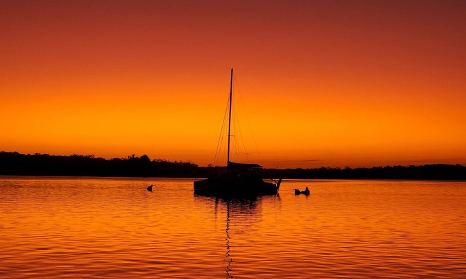 Tin Can Bay Apartment | Delightful three bedroom unit by the beach. Beautiful sunsets