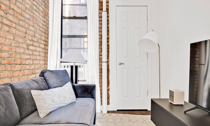 Chinatown Apartment | Deluxe LES 1BR w/W/D, steps to B/D Train & Park, by Blueground