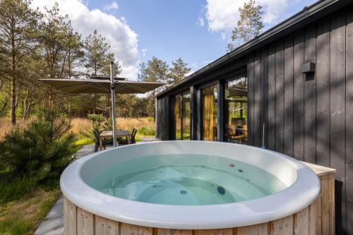 Giethmen House | Design bungalow met wellness in parkbos