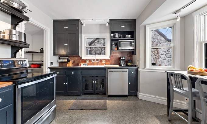 St. Louis Park House | Designer 4B home w/office, fenced-in yard, & gas fireplace