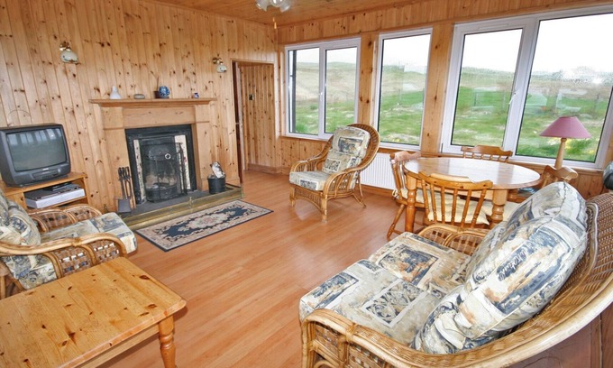 Kilmaluag Cottage | Detached croft cottage in an elevated position above Aird Bay in the spectacular north of Skye.