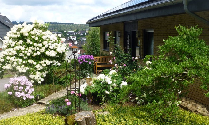 Losheim am See Apartment | Disabled-friendly apartment with garden, terrace, e-car charging facility