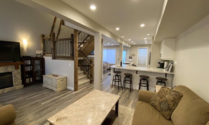 East Kootenay House | Discover modern mountain living at its finest in our beautifully renovated ski-in/ski-out townhouse.