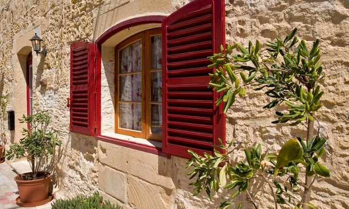 San Lawrenz House | Discover Tranquility: rustic elegance in this beautifully converted farmhouse.