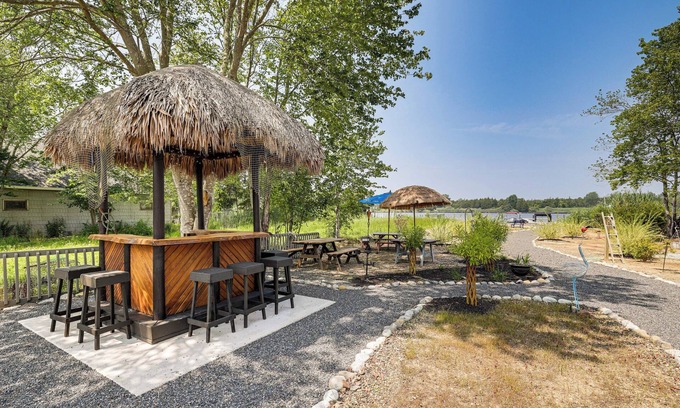 Waretown House | Dock + Backyard Bar: Spacious Barnegat Bay Retreat