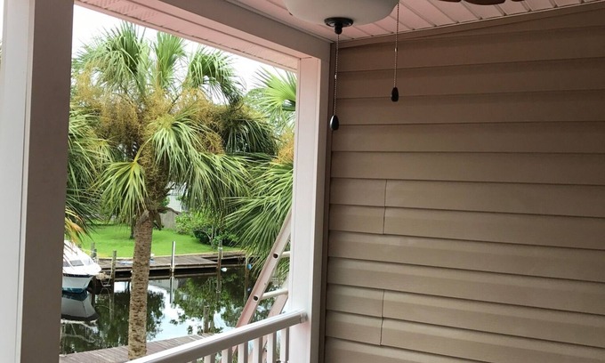 Harbour Towne House | Dock for your boat to fish the gulf! Cozy 2 bedroom townhouse in Pcb!