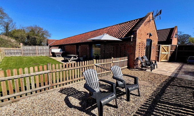 Dilham House | Dog and family friendly barn conversion with fully enclosed garden and hot tub