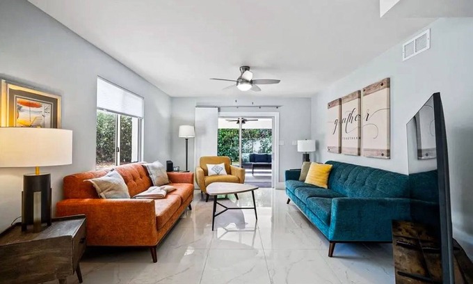 Isles of Capri Condo | Dog-friendly colorful condo with shaded patio, washer/dryer, & central AC