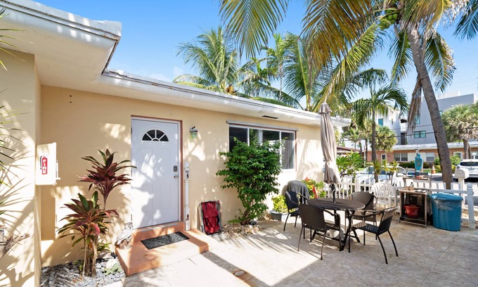 North Beach House | Dog-friendly duplex with communal patio, dining area, & grill