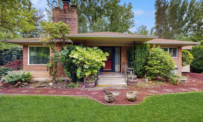Metzger House | Dog-friendly home on 1/2 acre with creek access, game room & 2 fireplaces