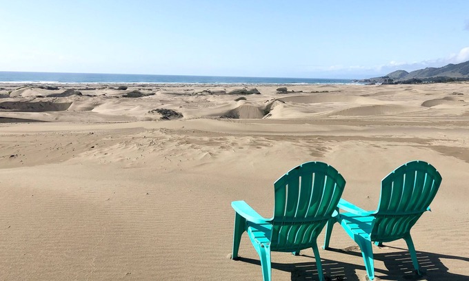 Inglenook House | Dog-friendly home with a firepit - across the dunes from the beach