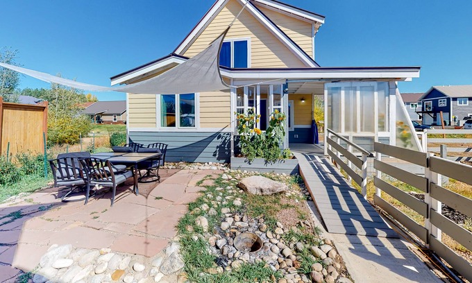 Gunnison House | Dog-friendly home with prime location, lovely patio, sun porch & WiFi