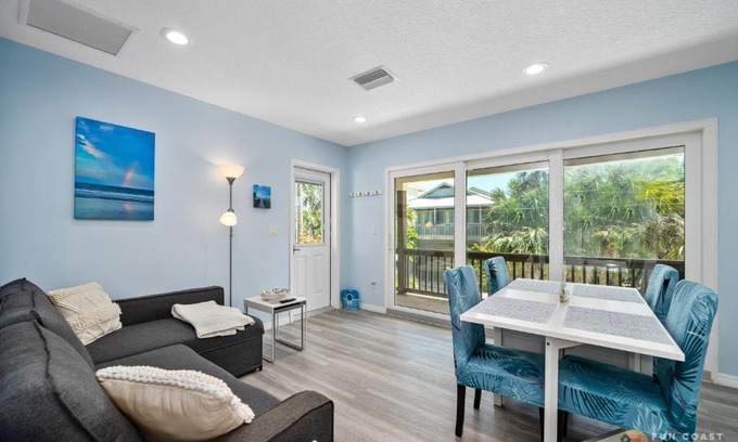 New Smyrna Beach Apartment | Dog Friendly Loft STEPS from Beach with Gas Barbecue Grill and Upstairs Deck!