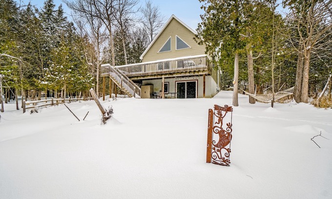 Honor House | Dog-friendly riverside retreat with canoe, kayaks, paddle-board, and wood stove